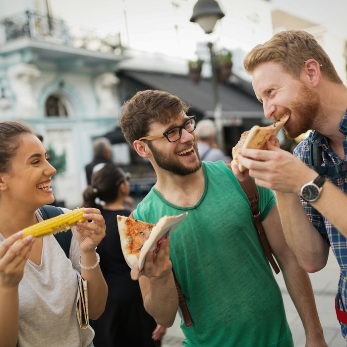 Travellers sharing a local meal